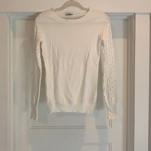 Express light weight sweater. Studs down the sleeves size medium. Cream color